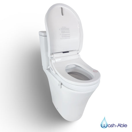 A standard toilet fitted with a height riser, demonstrating an accessible and cost-effective home modification.