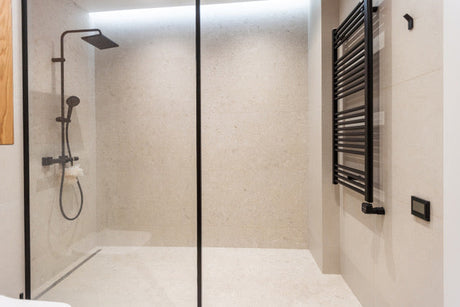 Is it safe to have an electric bidet toilet seat close to shower