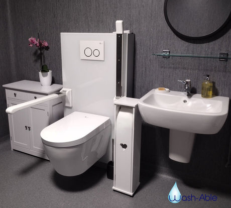 A luxurious modern bathroom highlighting the Washloo Levitate height-adjustable toilet elevated to protect stiff joints.