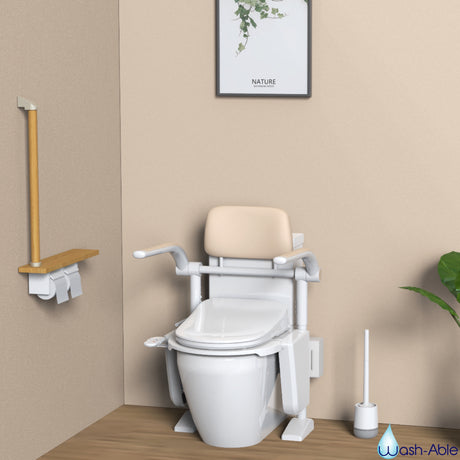 A modern home bathroom featuring a white Wash-Able Toilet Elevator fitted neatly over a toilet pan with integrated support bars.